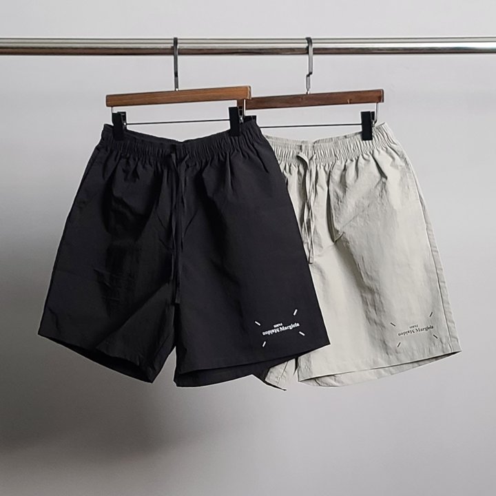  MAISON MARGIELA 메종마르지엘라 레터링 프린팅 나일론 5부 팬츠